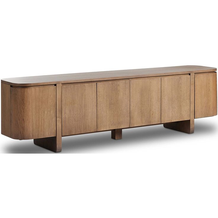 the sideboard is made out of wood and has four doors on one side, with two