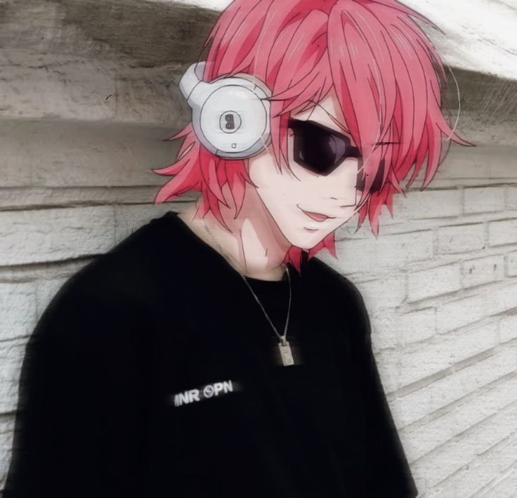 a man with pink hair wearing headphones and a black t - shirt is standing in front of a brick wall