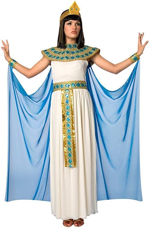 an egyptian woman dressed in white with blue drapes on her shoulders and arms