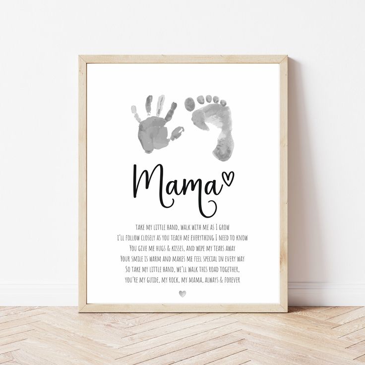 a baby's hand and foot print with the words mama on it