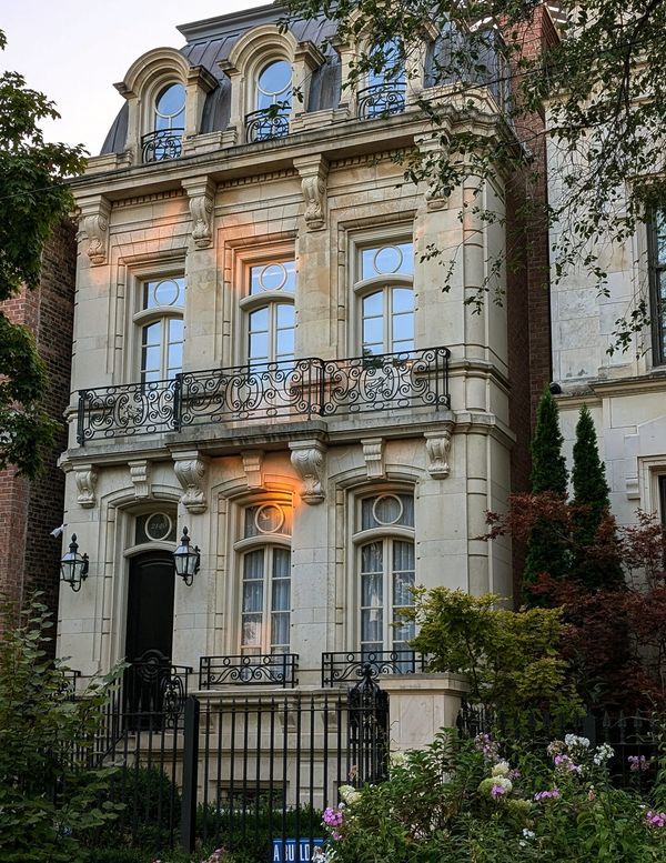 an old building with many windows and balconies