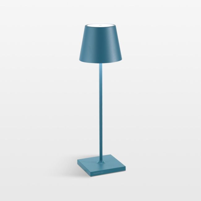 a blue lamp on a white background