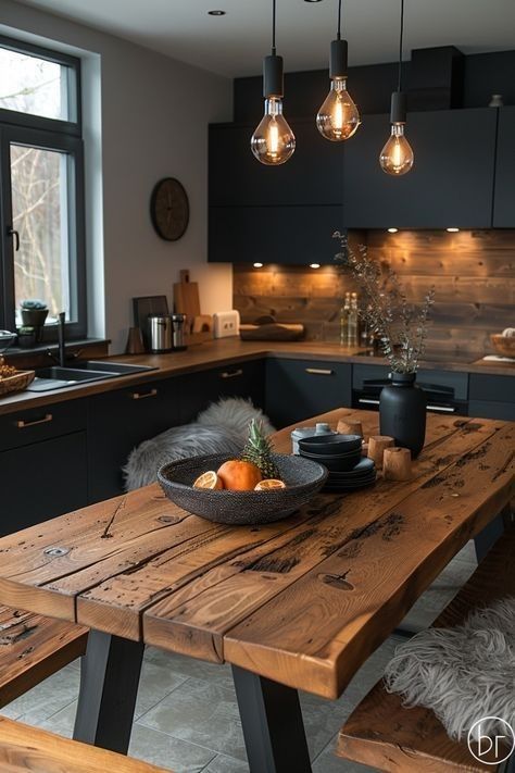 a wooden table sitting in the middle of a kitchen