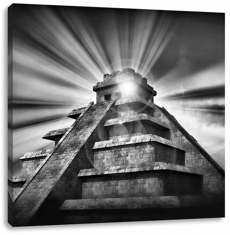 a black and white photo of a pyramid