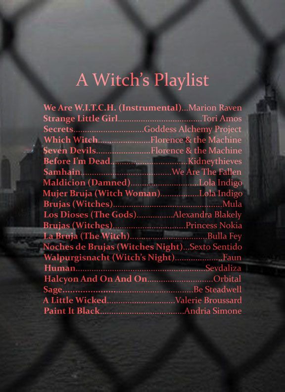 a wire fence with the words a witch's playlist written in red on it