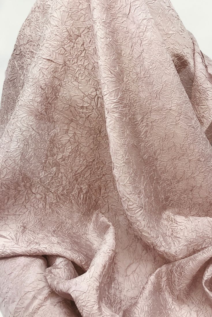 a close up view of an unmade bed sheet