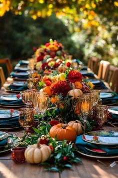 a long table is set with plates and place settings