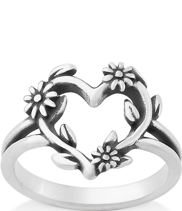 a heart shaped ring with flowers on it