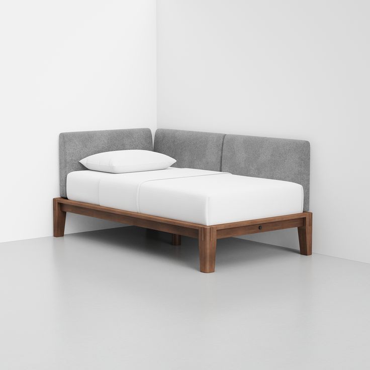 a bed that is made up to look like a couch