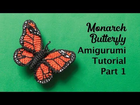 an orange and black butterfly sitting on top of a green surface next to the words monarch butterfly