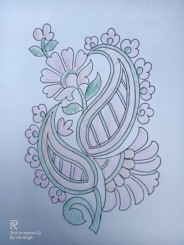 a drawing of an intricate design on paper