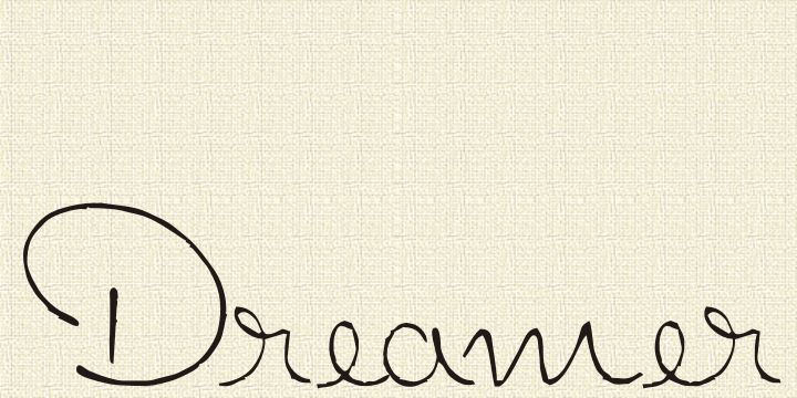 the word dream written in cursive writing on a white background with black ink