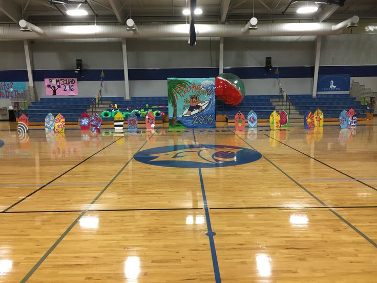 an indoor basketball court with many decorations on it