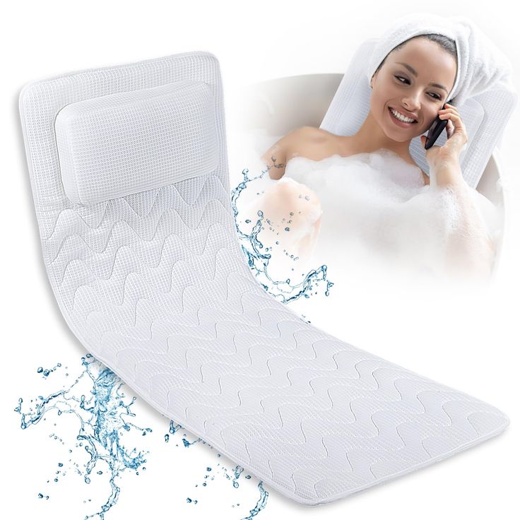 a woman in a bathtub talking on her cell phone next to a memory pillow