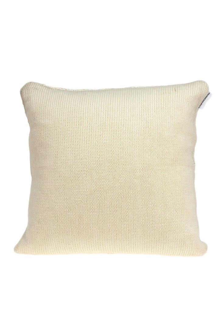 a white pillow on a white background