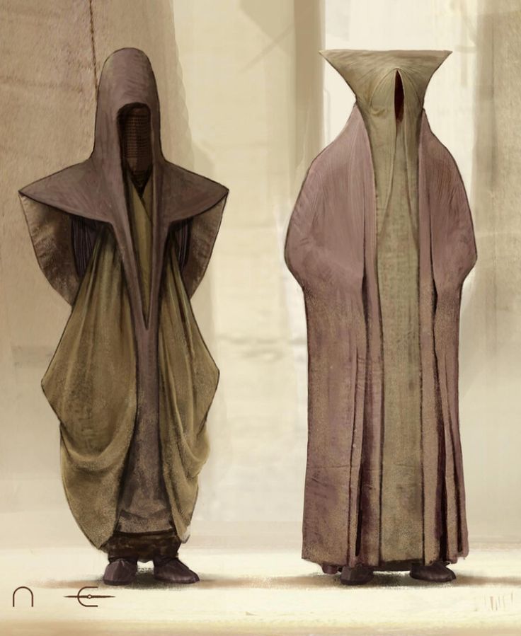 two statues are standing next to each other