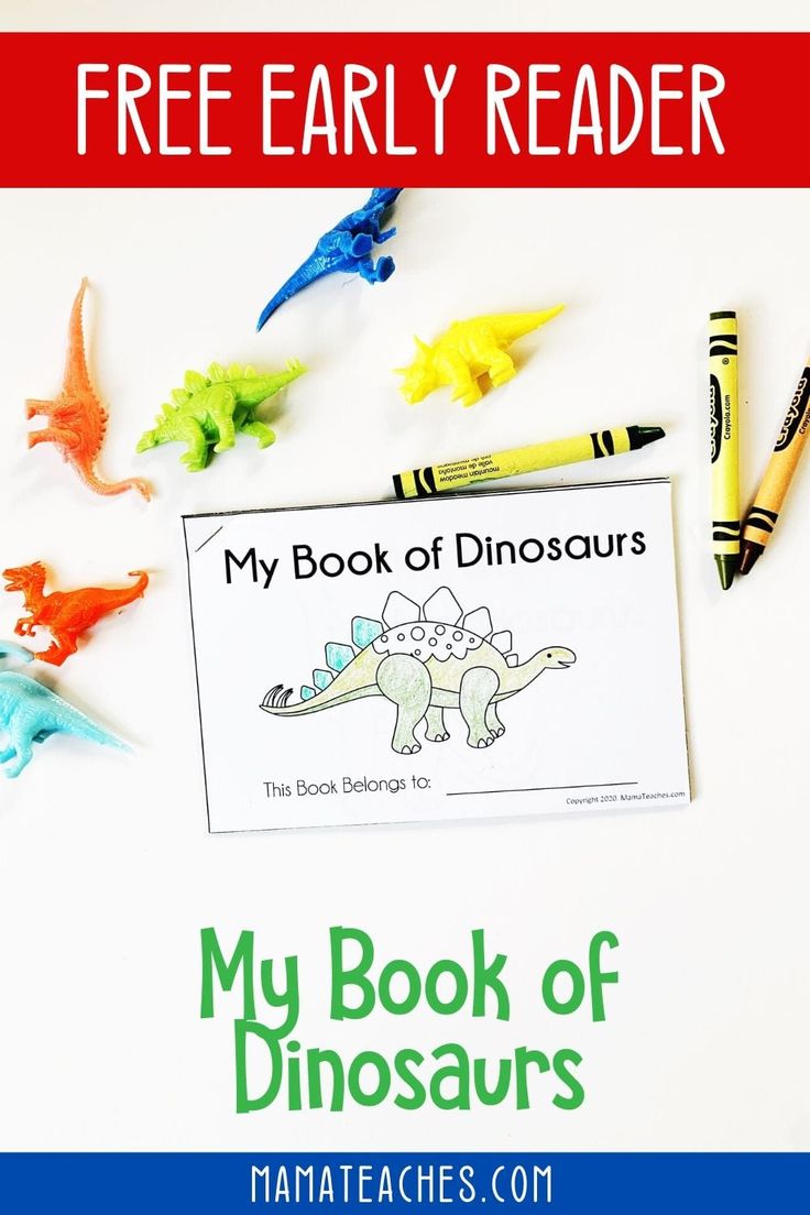 the book my book of dinosaurs is on top of a table with crayons and markers