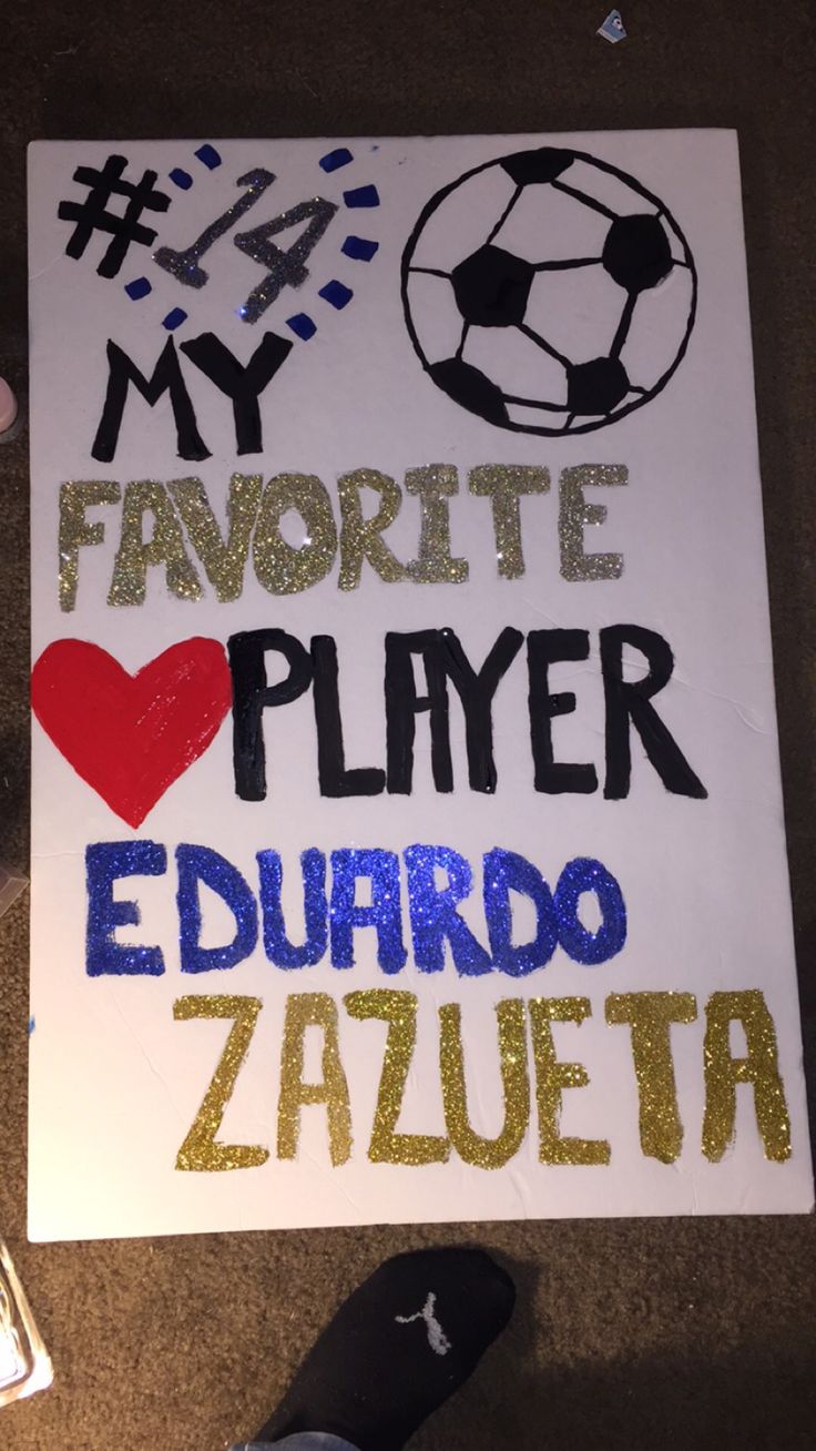 a sign that says my favorite player is edhirdo zalueta and has soccer balls on it