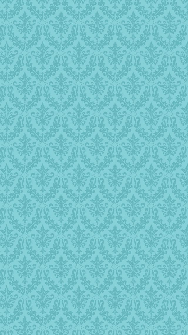 a blue wallpaper with an ornate pattern