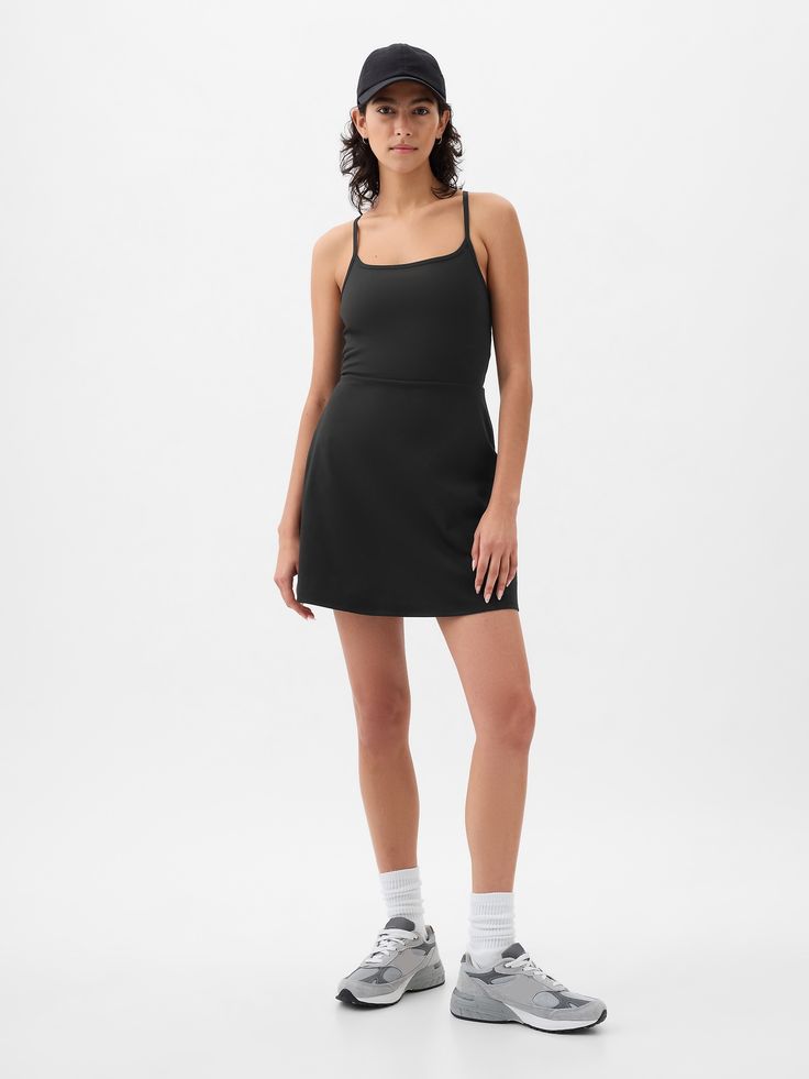 Soft brushed jersey exercise dress.  Moisture Wicking helps keep your skin dry.  Stretch allows freedom of movement while providing superior shape retention.  Square neck.  Adjustable spaghetti straps.  Built-in shorts.  This exercise dress is made with 79% recycled polyester.  Using recycled materials helps to conserve resources and reduce waste.  This product was made in a factory that invests in gender equality and women’s empowerment.  Through RISE Reimagining Industry to Support Equality) a Workout Dress Outfit, Athletic Dress Outfit, Exercise Fits, Capsule Style, Exercise Dress, Work Fits, Athleisure Dress, Mom Fashion, Athletic Dress