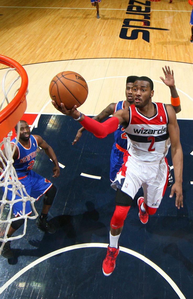 a basketball player is going to dunk the ball