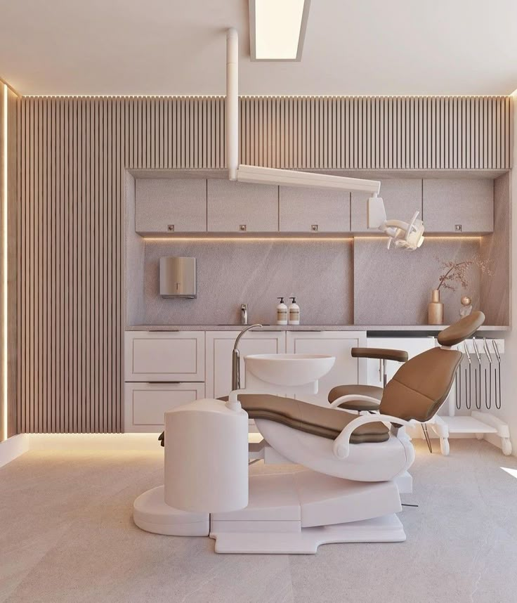 a modern dentist's chair in the middle of a room