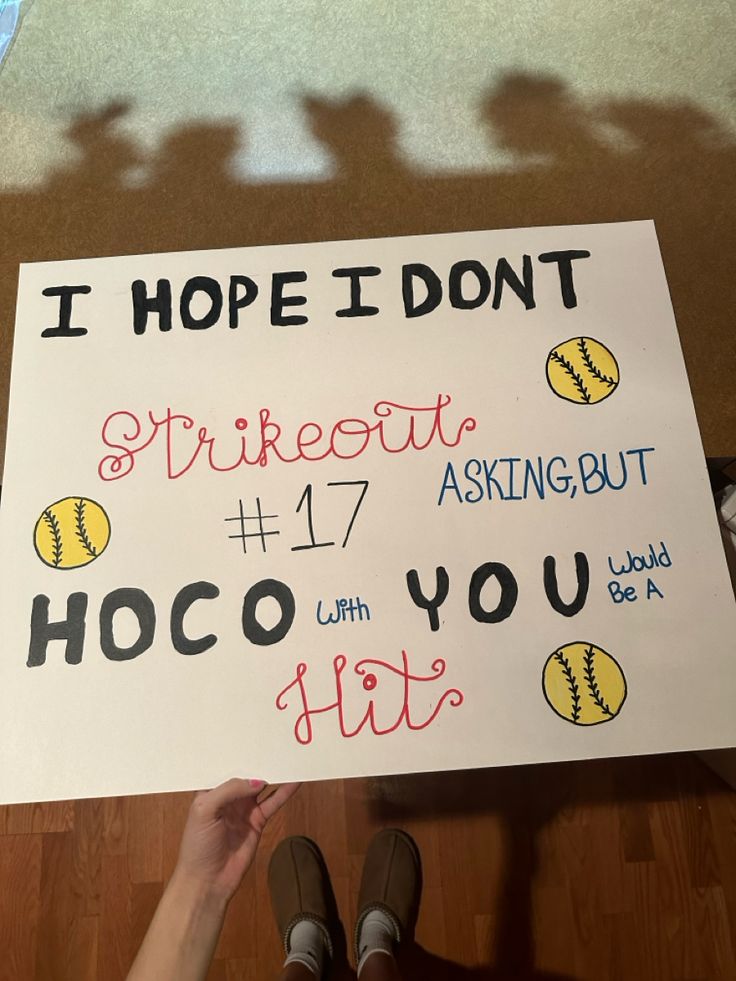 someone holding up a sign that says i hope i don't strikeout 17 asking but hoco with you hit