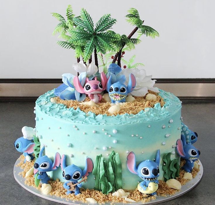 there is a cake decorated with lillies and palm trees