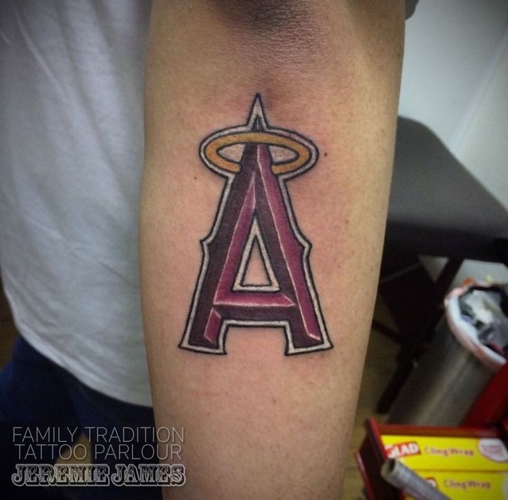 a tattoo with the letter a on it