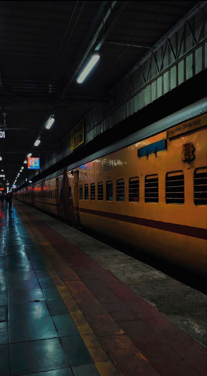 the train is stopped at the station waiting for passengers