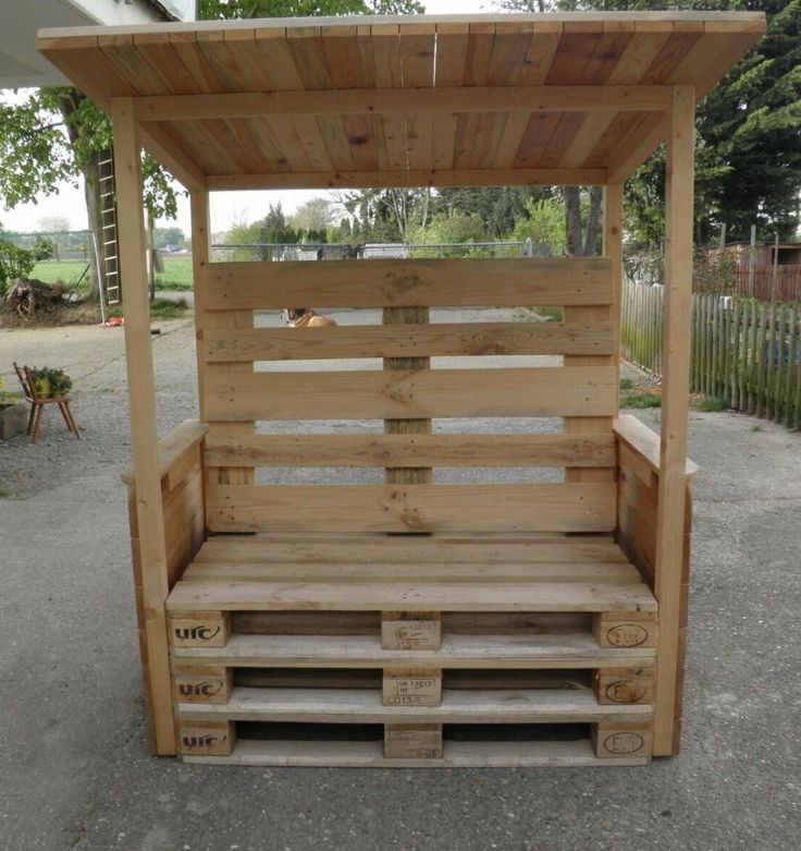 a wooden bench made out of pallet wood