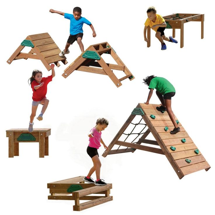 children playing on wooden play structures made from pallet boards and wood planks,