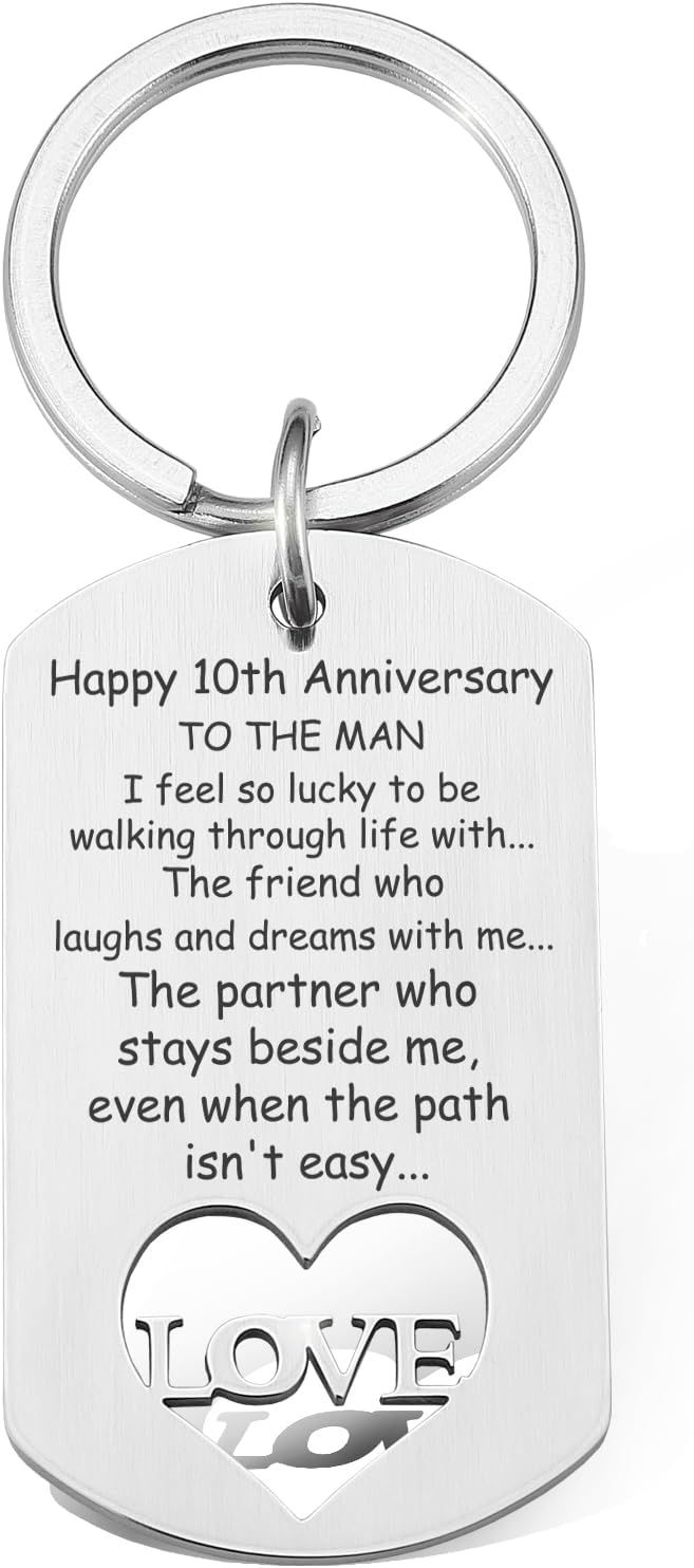 a keychain with the words happy 10th anniversary to the man he is walking through