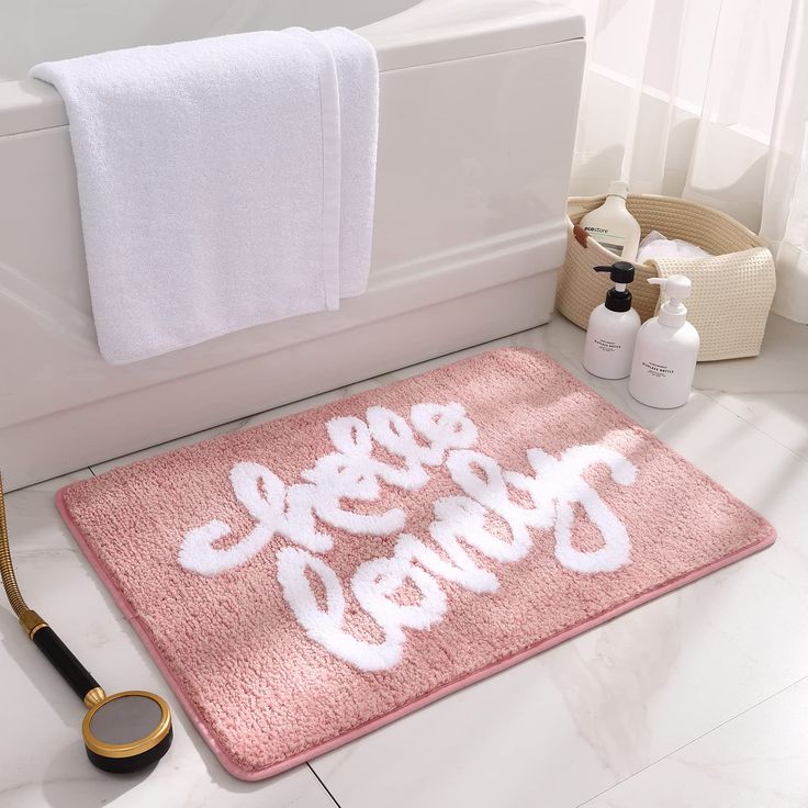 a bathroom rug with the words happy new year written on it