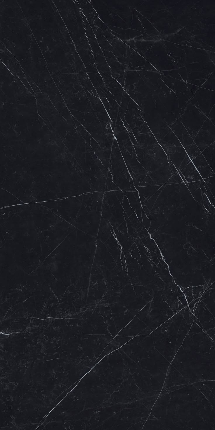 black marble textured with white lines on the top and bottom, as seen from above