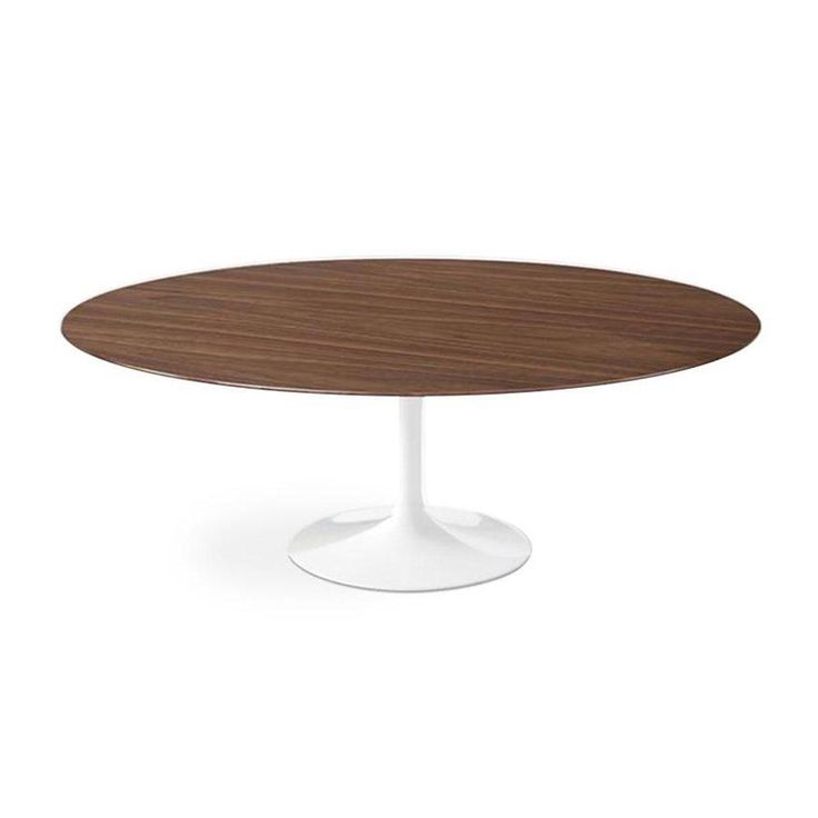 an oval wooden table with white base