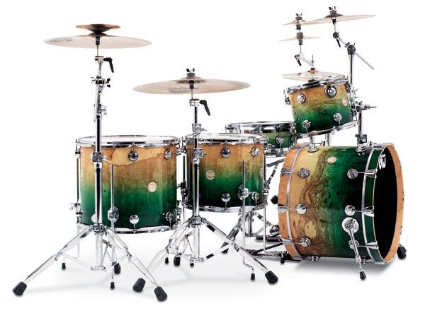 a green and yellow drum set on a white background