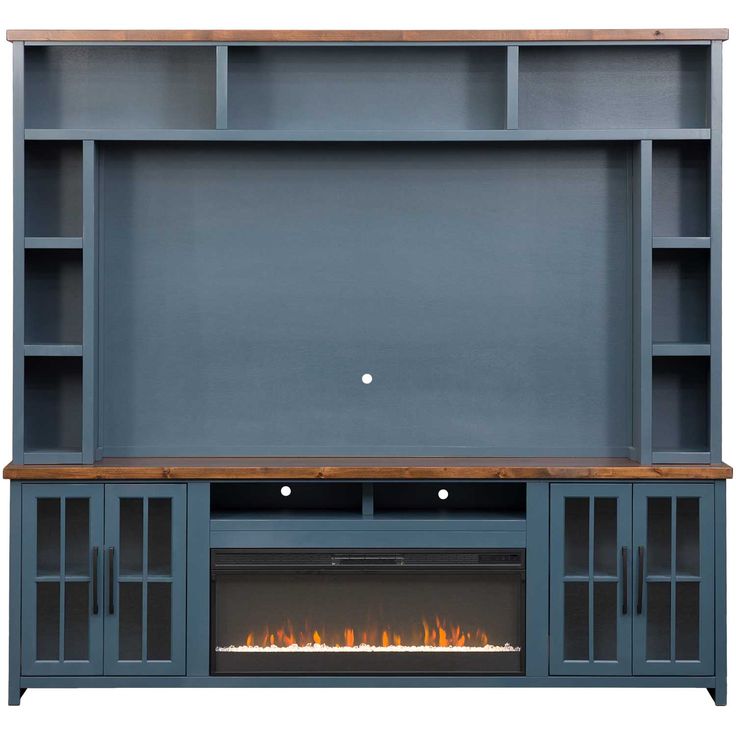 an entertainment center with a fireplace in the middle and shelves on either side, both open