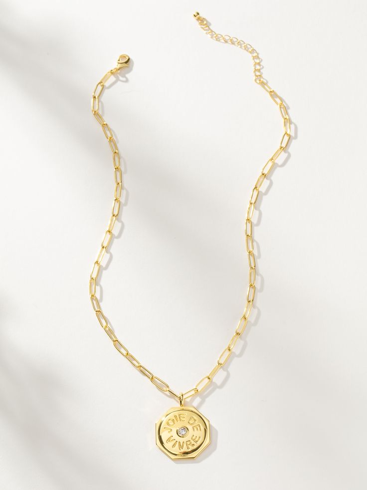 This chain and pendant necklace is one of the many joys in life, which makes sense since the French phrase “Joie De Vivre” means the joy of living. For a full look, pair the Joie De Vivre Pendant Necklace with our Joie De Vivre Bracelet. Or, if you’re looking for a gold necklace stack, try layering this statement pendant necklace with our Rebellious Curb Chain Necklace and Angel Number Key Necklace. | Gold Joie De Vivre Pendant Necklace | Women's Jewelry by Uncommon James Gold Necklace Stack, Uncommon James, Necklace Stack, Chain And Pendant, French Phrases, Joy Of Living, Key Necklace, Full Look, Angel Number