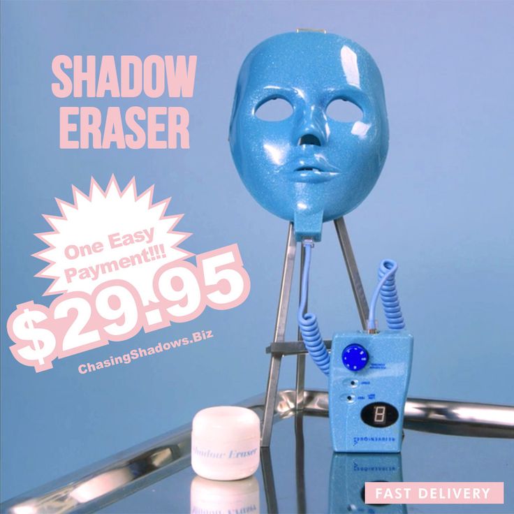 a blue plastic mask sitting on top of a table next to a small device with the words shadow eraser $ 29 955