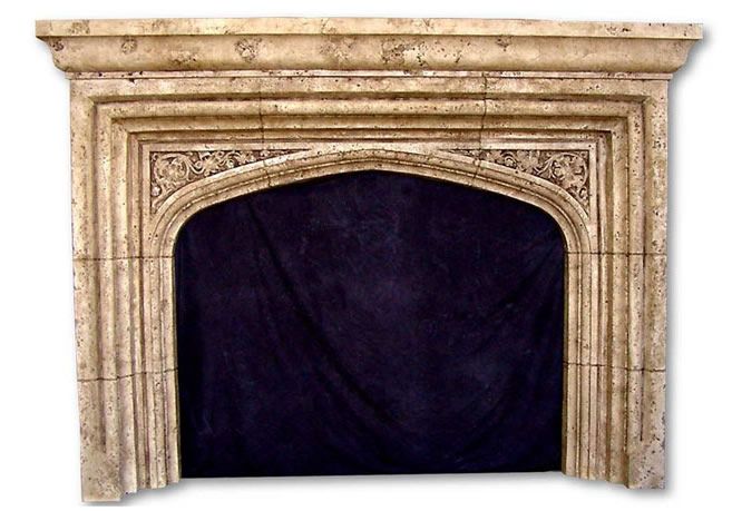 an old fireplace with a black cover on it's mantle and the top section is made out of marble