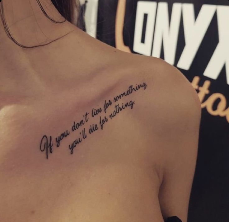 a woman with a tattoo saying if you don't live for something, or you'll die for nothing