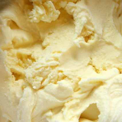 a scoop of vanilla ice cream in a bowl