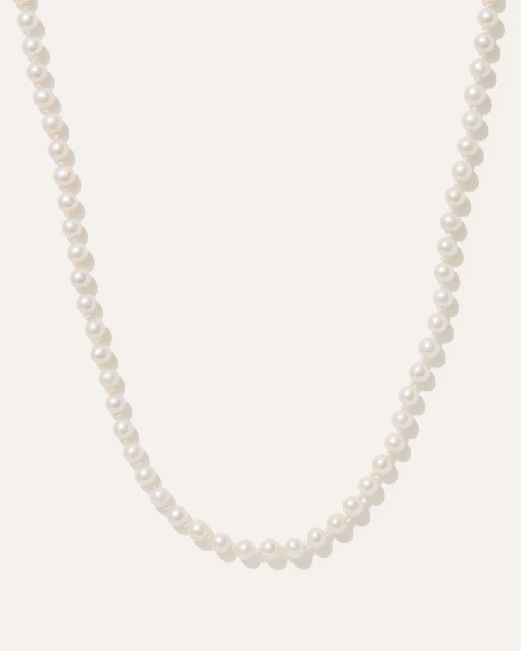 Elevate your style with our exquisite classic pearl strand necklace, featuring AAA quality freshwater cultured pearls meticulously strung on a 16.5 inch hand-knotted polyester cord. Secured with a luxurious 14K yellow gold lobster clasp, this elegant accessory exudes timeless sophistication. Pearl Strands Necklace, Pearl Strand, Cultured Pearl Necklace, Scarf Gift, Pearl Strands, Freshwater Cultured Pearls, Elegant Accessories, Strand Necklace, Cultured Pearls