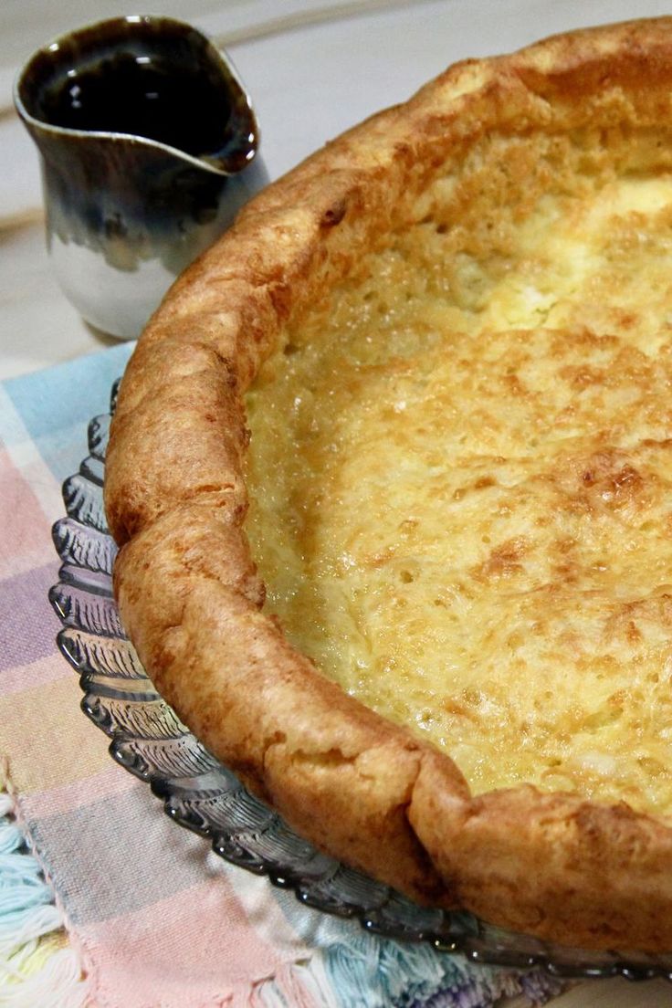 a pie sitting on top of a glass plate