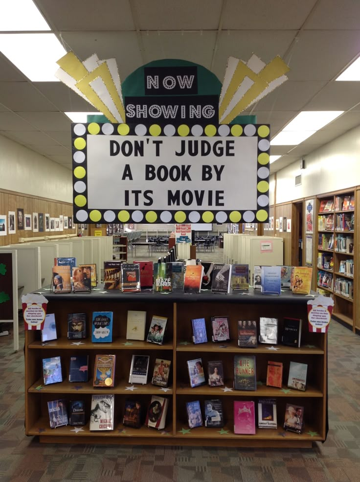 there is a sign that says show me don't judge a book by its movie