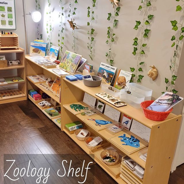 the children's bookshelf is full of books and toys for sale in the store