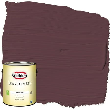 a can of paint with the lid open and it's brown color on top