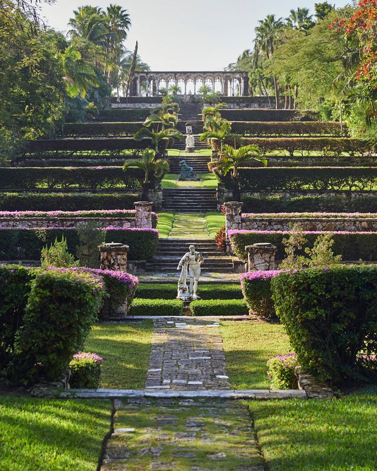 an elaborate garden with steps leading up to it