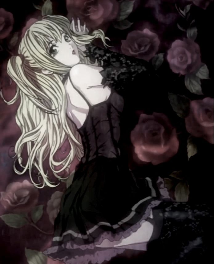 a woman with long blonde hair standing in front of pink roses and holding her hand on her chest